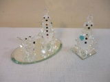 Two Swarovski Crystal Clown Figurines including clown with dog and clown with turquoise heart on