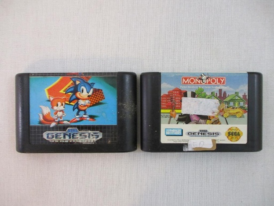 Two Sega Genesis Game Cartridges including Sonic the Hedgehog 2 and Monopoly, games have been tested