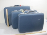 Two American Tourister Tri Taper Hardshell Luggage in Black and Blue