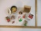 Assorted Vintage Christmas Ornaments including Avon Musical Toy Box, Cast Metal Santa Figure and