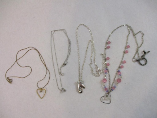 Four Necklaces and Pendants featuring hearts, mitten, and wishbone, 2 oz