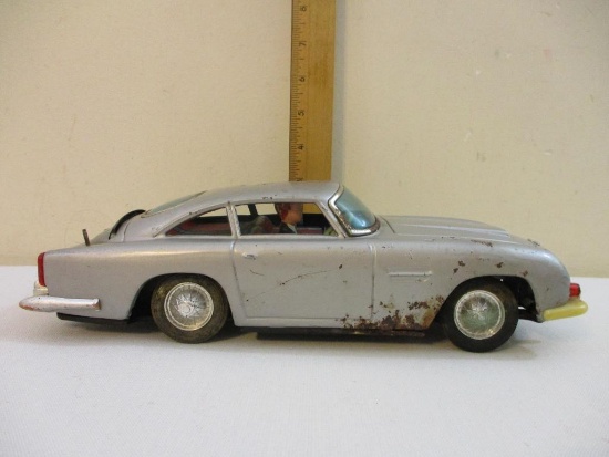 Vintage Gilbert James Bond 007 Aston Martin DBS Japanese Friction Car, see pictures for condition,