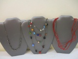 Three Beaded Necklaces including red seed bead and more, 3 oz