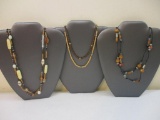 Four Unique Beaded Necklaces including wood beads and more, 3 oz