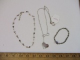 Three Silver Tone Fashion Necklaces including infinity heart and more, 2 oz