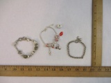 Three Silver Tone Bracelets including Avon consultant charm bracelet, heart charm and more, 3 oz