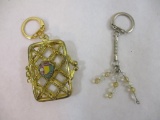 Two Keychains including gold tone Indiana purse and beaded, 2 oz