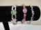 Three Bracelets: silver tone starfish, dolphins and pink beaded stretch, 2 oz
