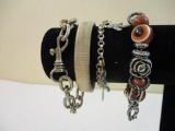 Four Bracelets including beach charm bracelet, rose and owl stretch, and more, 4 oz