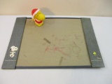1965 Snoopy and Woodstock Desk Blotter and 1972 rubber Woodstock Santa Figure (United Feature