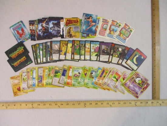 Assorted Trading Cards from Various Games including Pocket Monsters, Neopets, Super Mario and
