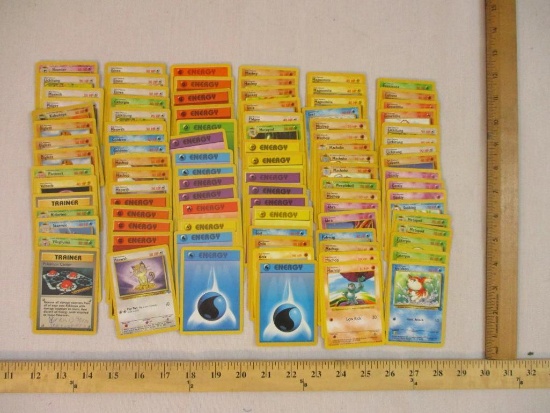 Assorted Pokemon Cards including foil Kabutops, Meowth, Pidgey, Lickitung and many others, 7 oz