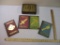 Set of Four Mojang Minecraft Handbooks including Essential Handbook, Combat Handbook, Construction