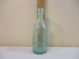 D. McCullin Wilmington Del Vintage Embossed Glass Bottle, D on back, see pictures for condition AS