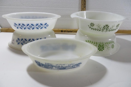 Five Pieces of Glasbake oven ware, three oval baking dishes and two round ones.