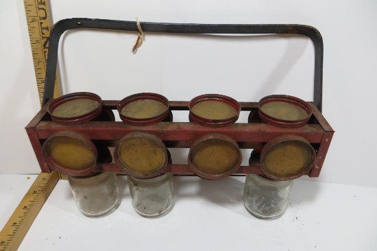 Rotating Tool Caddy with Baby food jars that screw into lids attached to a wooden block