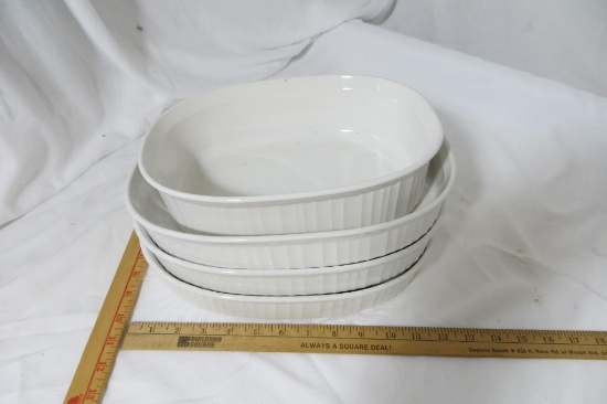 Four White Corning Ware Casserole Dishes