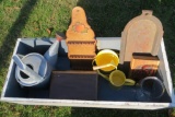 Blue Box on legs with items inside it. Child's garden set, spoon rack, metal watering can, cast iron