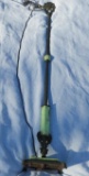 Antique Floor Lamp with green marble that is cracked in the bottom plate