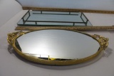 Two Mirrored Dresser Trays. Gold trim oval and rectangular with railing (some small chips)