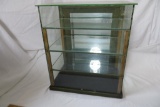 Table Top Glass Showcase with mirrored back and 3 glass shelves. 19