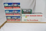 Six Hess Trucks, 1993, 2 1994, 1990, mini 2012, and a bank. NIB.