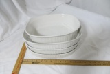 Four White Corning Ware Casserole Dishes
