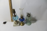 Three lamps, 2 electric and 1 oil lamp.