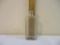 The Converso Co Columbus Ohio Embossed Clear Glass Bottle, marked 568 on bottom, 7 oz