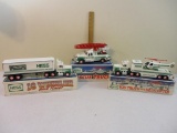 Three 1990s HESS Trucks including 1992 18 Wheeler and Racer, 1994 Rescue Truck, and 1995 Toy Truck