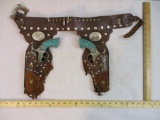 Set of Two Matching Hubley Texan Jr Turquoise Handled Cap Guns with Double Holster, 2 lbs