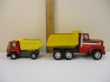 Two Pressed Steel Dump Trucks from Nylint and Topper, 1 lb 6 oz