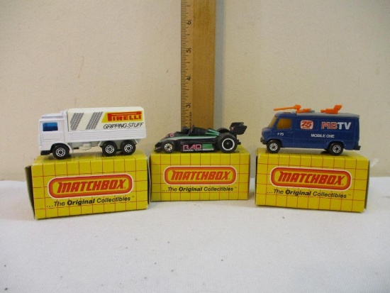 Three Matchbox Diecast Cars in original boxes: MB68 TV News Truck, MB 49 Volvo Tilt Truck, and MB65