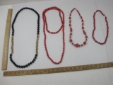 Four Beaded Necklaces: red and black, 9 oz
