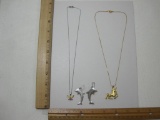 Two Fashion Necklaces including gold tone unicorn pendant, butterfly pendant, and silver tone