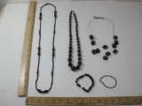 Five Black Jewelry Items including three necklaces and two bracelets, 4 oz