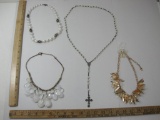 Four Assorted Fashion Necklaces including cross pendant, gold tone feathers and more, 5 oz