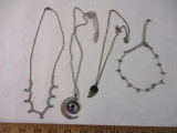 Four Silver Tone Necklaces including crescent moon pendant and more, 2 oz