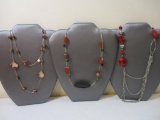 Three Necklaces including silver tone with red beads and more, 5 oz
