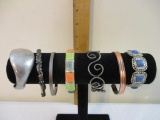 Seven Assorted Braclets including bangle, cuff, stretch and more, 5 oz