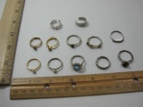 Assortment of Rings, gold and silver tone with gemstones and resizable toe ring, 1oz