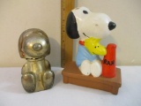 Two Snoopy Items including silverplated bank and ceramic figure, 1 lb 14 oz