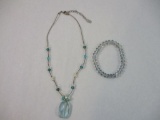 Two Blue Beaded Jewelry Items: light blue beaded stretch bracelet and necklace, 2 oz