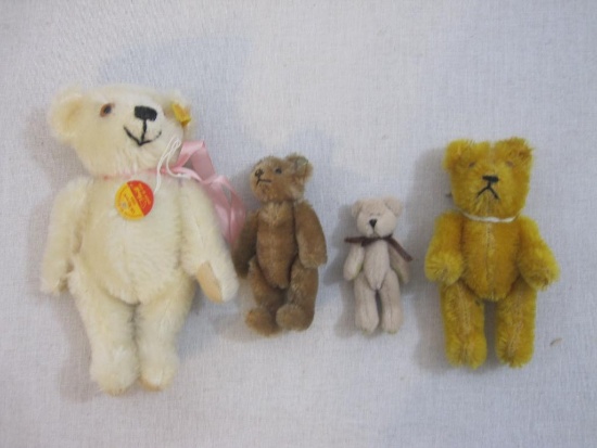 Four Small Poseable Teddy Bears including Steiff bear with ear button and tags, 5 oz