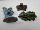 Three landscape miniatures, including wave and tree stump, 6oz