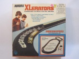 1973 Aurora Xlerators Controlled Slotless Electric Racing Set, set is complete with some extras,