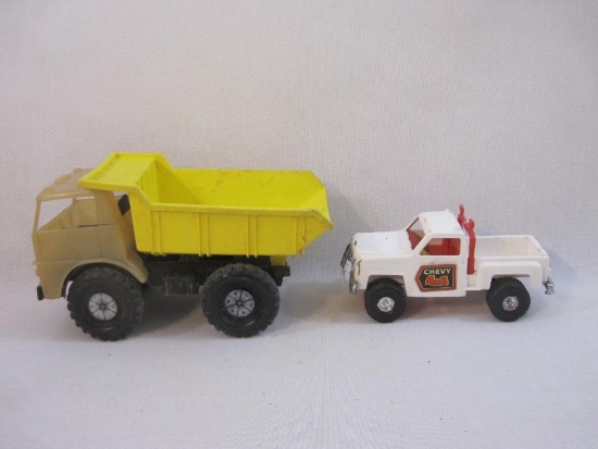 Two Pressed Plastic Toy Trucks: Processed Plastic Co Chevy 4x4 and Gay Toys Inc Dump Truck, see