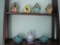 Four birdhouses, 2 Candle holders, and Avon 1978 mini pitcher and bowl set