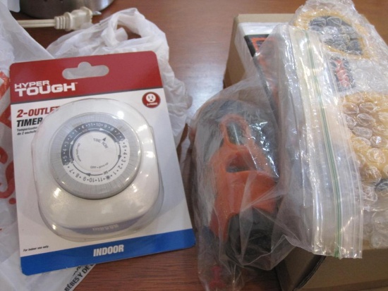 Household Items: Outlet timer, laser level, and 2 picture hanger devices