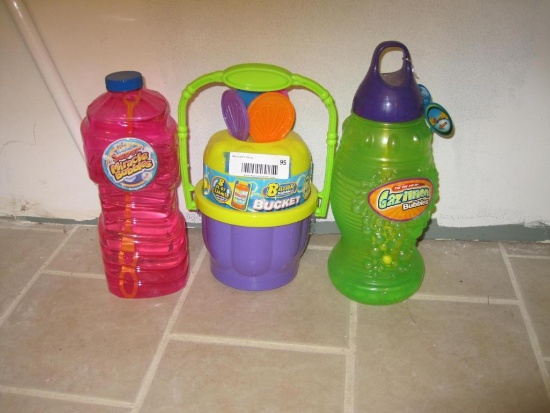 Two Large Bottles of Bubbles and Bubble Accessories